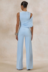 Opulence | Light Blue Jumpsuit With Cape Sleeve and Draped Details