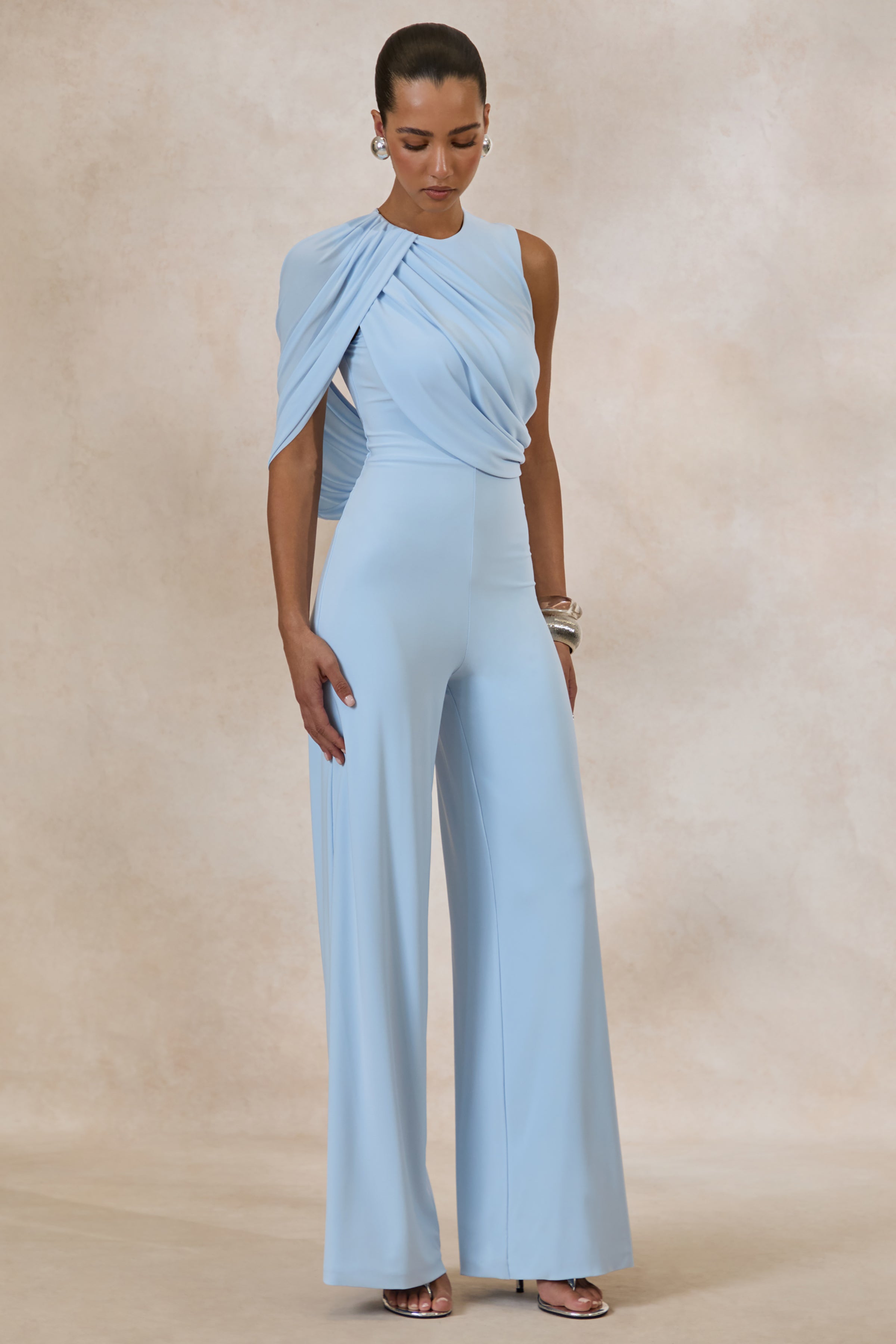 Opulence | Light Blue Jumpsuit With Cape Sleeve and Draped Details